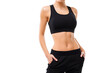 © Oksana_Latysheva - Woman's Midsection in Black Sportswear  Isolated On White Background. Woman in Sportswear Showing Abdominal Muscles
