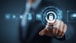 © Cheewynn - A person in a suit touches a digital lock icon on a transparent virtual screen, symbolizing cybersecurity and data protection