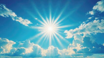 Wall Mural - clear sky with a shining sun and rays in the atmosphere, with light fluffy clouds below