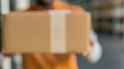 Poster - Delivery courier holding cardboard box package
