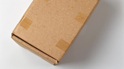 Poster - Cardboard box rotating on white background