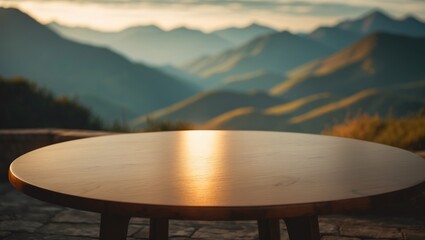 Poster - Scenic outdoor table setup overlooking blurred mountain landscape during sunrise in warm tones