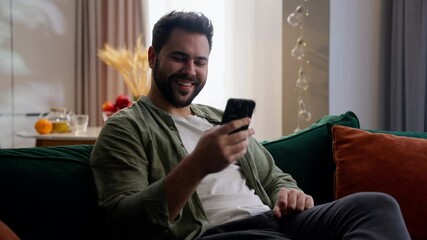 happy caucasian business man male guy client businessman freelancer showing mobile phone smartphone 