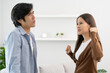 © Pormezz - Family problems, Asian couple quarrel together at home. woman angry on man and man feel annoy.