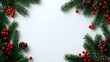 © oman - Festive holiday frame of pine boughs, red berries, and pine cones on a white background, creating a blank space ideal for text or imagery