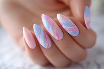 Poster - Close-up of a hand showcasing elegantly manicured nails with a creative design, featuring swirling pastel colors and shimmering accents for a modern and chic look.