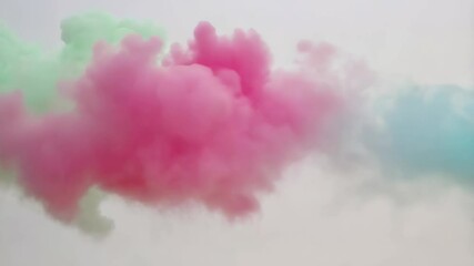 Poster - Colorful smoke clouds in pastel pink and blue against a white background  