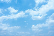 © Sloek Prey - Serene Blue Sky with Fluffy White Clouds Heavenly Summer Day Background Image