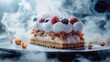 © Aleksandra - Close-up of a creamy layered dessert topped with whipped cream, fresh raspberries and blueberries, with powdered sugar and smoke effect on a dark plate