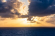 © edb3_16 - Sunset Over Calm Ocean with Dramatic Cloudscape and Distant Horizon