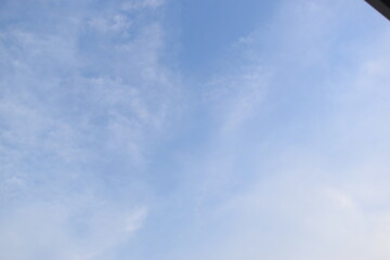Wall Mural - beautiful blue sky and white cloud background in springtime