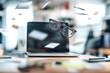 © qohhar - Busy workspace with papers and eyeglasses floating in mid-air over laptop