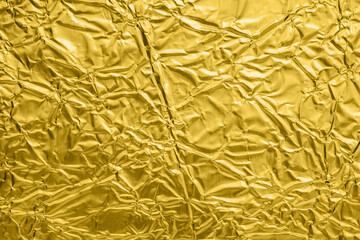 Wall Mural - luxury shiny metallic golden foil crumpled texture background