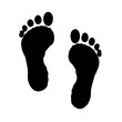 © Emon - man footprints black silhouette vector illustration