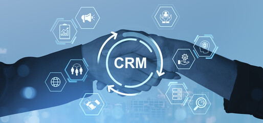 Poster - Business handshake with CRM icons and digital interface on blue background symbolizing customer relationship management and data-driven collaboration.