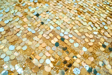 Poster - Sparkling gold sequin texture with scattered metallic circular decorations for festive design backgrounds and event invitations