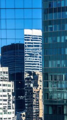 Poster - Modern City Skyline Reflections in Highly Polished Glass Facades