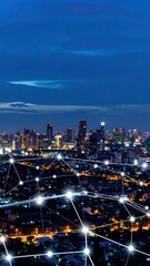Poster - Urban Skyline Illuminated by Streetlights and Glowing Network Below