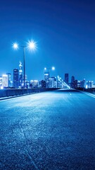 Poster - Calm City Skyline at Night with Blue Light from Streetlights