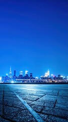 Poster - Serene City Skyline at Night with Cool Blue Streetlight Glow