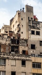 Poster - Urban Decay in City Skyline with Crumbling Facades and Broken Windows