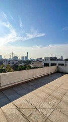 Poster - Rooftop View of City Skyline in Artistic Style Under Clear Sky