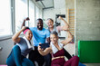 © Marko Geber - Diverse group of happy seniors and fitness trainer taking a post-workout selfie at the gym