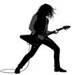 © noor - Silhouette of a long haired guitarist playing an electric guitar in a rock and roll style performance