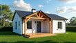 © Perecciv - cozy white house with wooden porch located on green lawn.