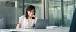 © Stock 4 You - Young businesswoman professional employee using pc doing online banking analysing at workplace. Asian middle-aged business woman working on laptop computer in office, taking notes. Banner, copy space