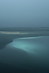 Poster - Tranquil coastal landscape, soft hues of sea and sand