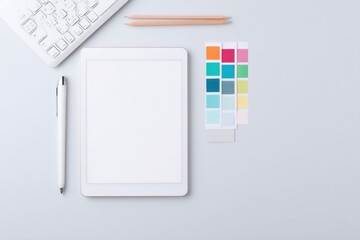 Poster - capture minimalistic workspace with graphic design tools showcasing clean layout against white backg