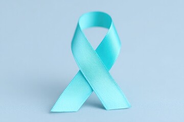 Poster - close-up of single awareness ribbon against plain background