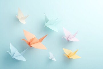 Poster - illustration of origami figures in various styles floating against light background