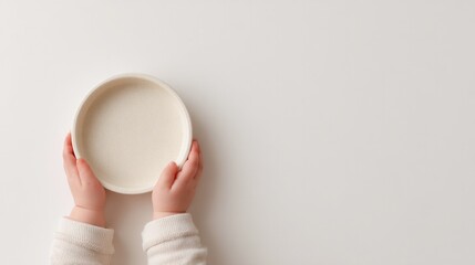 Poster - top-down capture of single child food item on clean solid background embracing minimalism and spacious copy space with