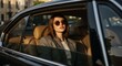 © alisya - Chic passenger in luxury car sunlit