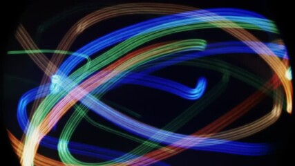 Poster - Abstract light painting with colorful curved lines on black background
