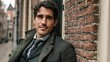 © Yopi - Young Dutch Man in Modern Street Outfit Posing Confidently Against Historic Brick Wall