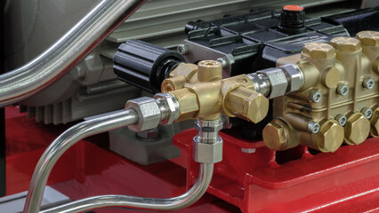Poster - Copper block with valves on industrial air compressor, industrial concept background