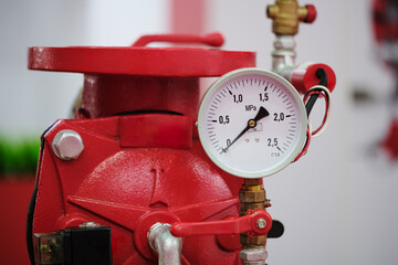 Aufkleber - Stainless steel pipe with a white pressure gauge on it as part of a fire protection system
