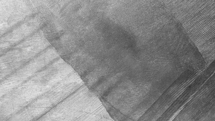 Aufkleber - A grey and white background with a pattern of lines and dots. The background is a mix of wood grain and a metallic texture