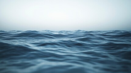 Poster - Calm ocean waves under a hazy sky.