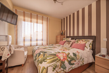 Poster - A classic-furnished bedroom with a double bed and black metal headboard