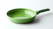 © Mokhtar - Bright green frying pan on white background. Perfect for cooking delicious meals!
