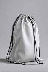 Poster - White Drawstring Bag Mockup on Gray Background Studio Shot Clean Minimalist Style Product Display Template Presentation
