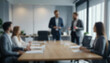 © Adi - having a meeting in a blurry office, the atmosphere of a group of people having a meeting in a natural-themed, modern office with a wooden table, with a blurry office background