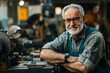 © Studio - A man in an apron standing in front of a lathe with his arms crossed
