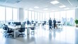 © SSuperTier - A softly blurred office interior with neutral tones and open-plan desks creates a clean, modern corporate atmosphere. Natural light streams through large windows, casting subtle highlights across the