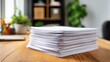 © Aether Pixels - Stack of White Paper on Wooden Desk in Office Setting Close Up Shot Business Documents and Paperwork