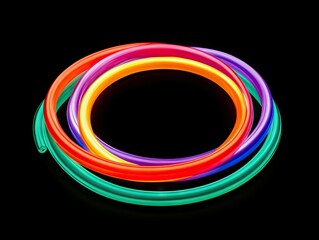Poster - Abstract light trails intertwine in vibrant colors against a black background. creating a visually striking pattern that evokes energy and movement. suitable for digital art or design use